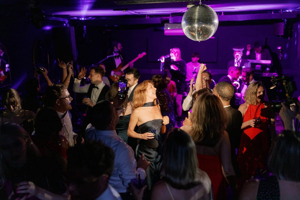 Wedding guests dancing at evening reception party at Ripple Court Estate wedding in Kent