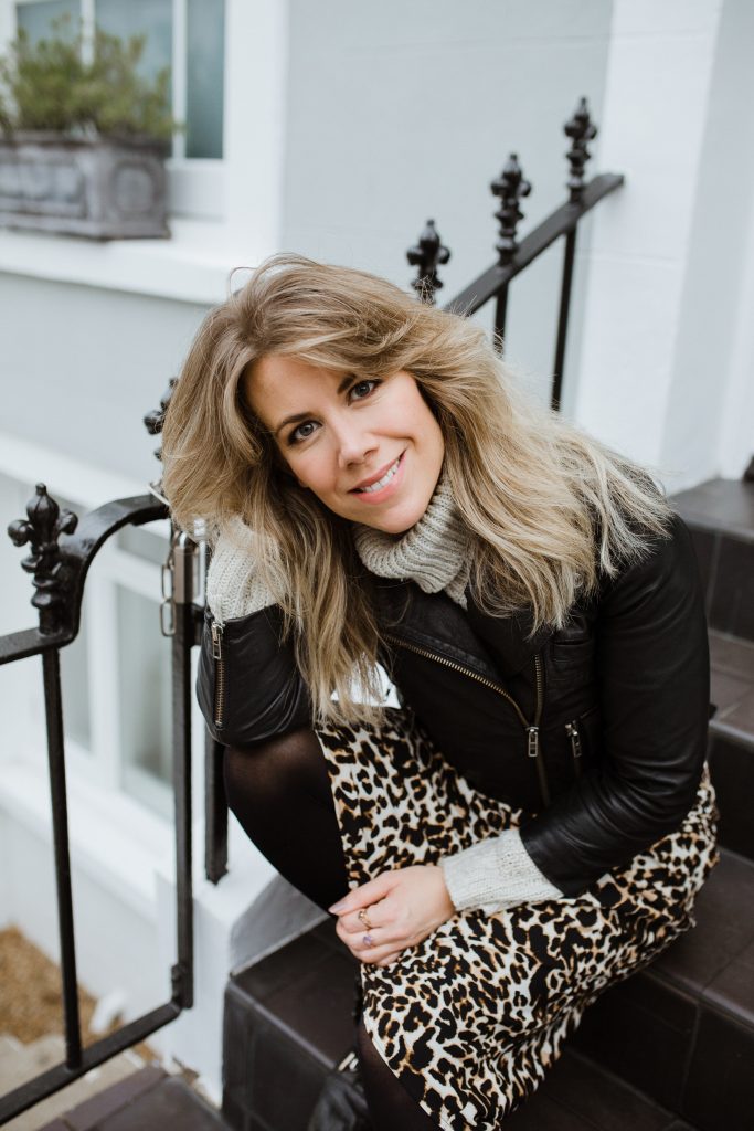 hair and makeup artist sat on step in notting hill